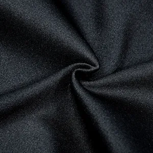 Detailed close-up of premium black mesh fabric texture for stylish long sleeve maxi dress.
