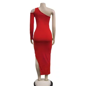 Detailed back view showing the fit and side slit of this red one-shoulder maxi dress