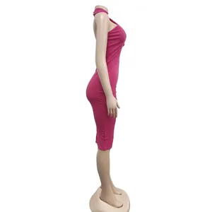 Side view of a vibrant pink halter neck sleeveless bodycon midi dress on a mannequin