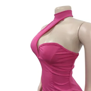 Close-up view showing the elegant pink halter neck and cutout detail of this bodycon dress