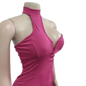 Side view detail showing the pink halter neck sleeveless bodycon dress on a mannequin