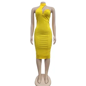 Elegant yellow sleeveless halter neck bodycon midi dress on mannequin detail view