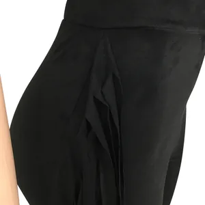 Close-up detail of black matte fabric with ruffle design on this casual two-piece set