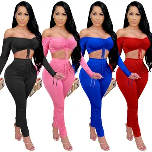 Ensemble de mode deux pièces pour femmes avec haut court dénudé et legging froncé en 4 coloris