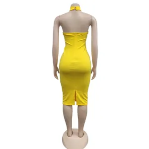 Back view of a yellow halter neck bodycon midi dress on a mannequin