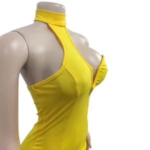 Detail of yellow halter neck sleeveless bodycon dress with deep V-cutout