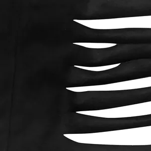 Close-up of shredded horizontal cut-out design on black casual fashion two-piece set