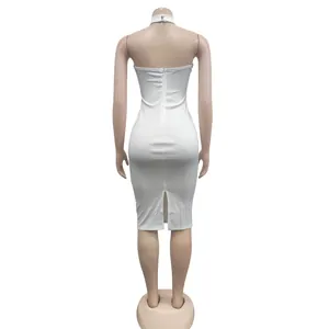 Detailed back view of a white halter neck bodycon midi dress with a sleek zipper closure