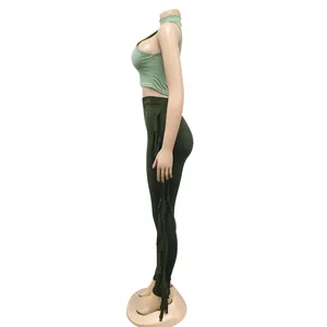 Detailed side view of women's two-piece leisure set with sleeveless top and fringed pants