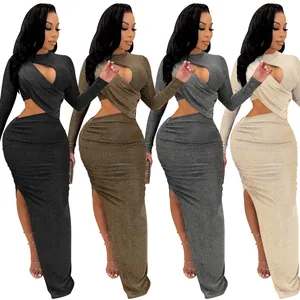 Detail view of long sleeve cutout split maxi dress available in four sparkly colors