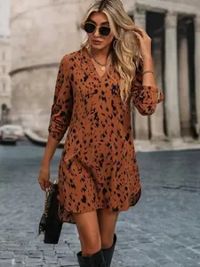 Fashionable leopard print long sleeve dress featuring a chic V-neck slim fit style