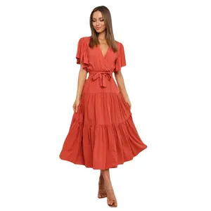 Vestido midi bohemio de terracota con cuello en V, mangas con volantes y lazo en la cintura