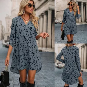 Elegant blue-grey leopard print mini dress featuring long sleeves and a stylish V-neck.