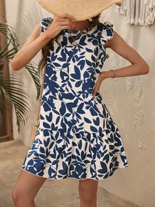 Full-length view of a summer loose-fitting dress with blue leaf print and ruffled hem