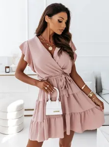 Elegant pink V-neck tiered mini dress with waist tie and flutter sleeves for women