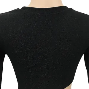 Detailed macro view of black shimmery knit fabric on the back neckline of the dress