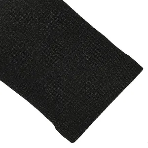 Close-up of black knitted fabric texture for long-sleeve dress detail.