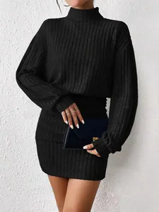 Close-up of elegant black ribbed high-neck bodycon mini dress showing knit texture