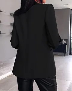 Back view of a black women's blazer featuring chic rolled-up sleeves and slim fit design.