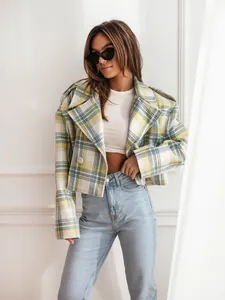 Chic green and yellow plaid woolen crop jacket styled with light wash blue jeans
