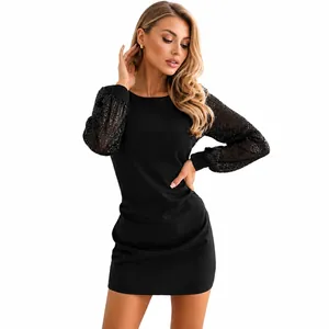Elegant black round neck mini dress featuring stylish sequin patchwork long sleeves