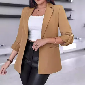 Elegant women's solid color blazer with rolled sleeves for professional autumn outfits