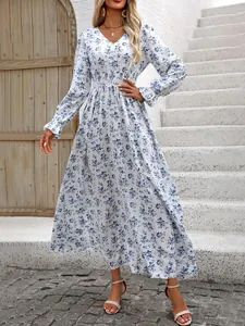 Elegant floral V-neck long sleeve maxi dress with smocked waist in white and blue