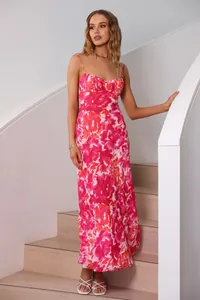Elegant French floral maxi slip dress with a low-cut neckline and thin straps for summer.