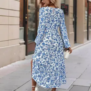 Elegant blue floral print long sleeve maxi dress with ruffled hem and side slit