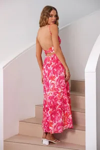 Detailed back view of pink floral backless maxi dress with elegant spaghetti straps