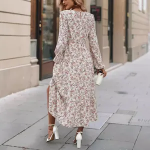 Elegant floral print long sleeve midi dress featuring a round neck and ruffle hem detail