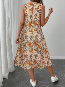Rear view detail of a sleeveless floral midi dress with vibrant orange flower patterns