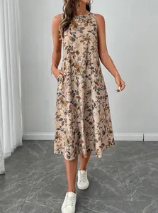 Detailed view of sleeveless floral midi dress with side pockets and elegant print