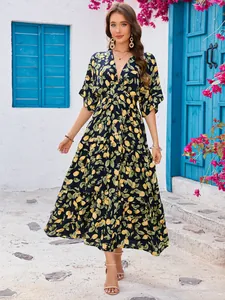 Boho Maxikleid mit Zitronenmuster, tiefem V-Ausschnitt und Fledermausärmeln in Marineblau
