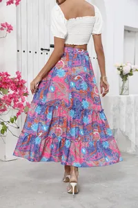 Back view detail of a vibrant bohemian paisley print tiered maxi skirt for summer vacations