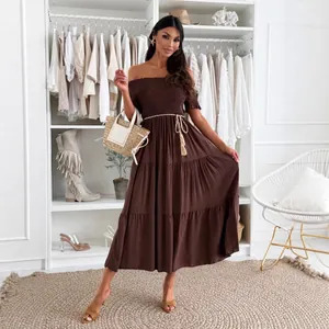 Elegant brown off-the-shoulder smocked tiered maxi dress with waist tie for women.