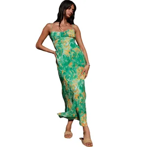 Full body view of a French floral spaghetti strap midi dress in vibrant green and yellow