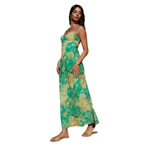 Side view of elegant green floral maxi dress featuring thin straps and backless design