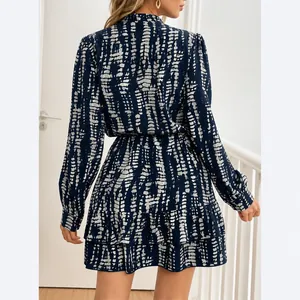Elegant slim fit long sleeve V-neck ruffle dress with a navy abstract pattern print