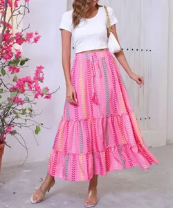 Bohemian pink printed maxi skirt with fringe drawstring styled for summer vacation outfit
