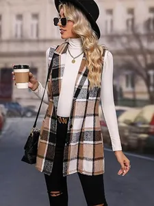 Close-up of the stylish brown plaid sleeveless lapel vest on a model in an urban setting.