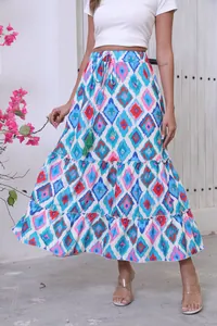 Detailed view of bohemian geometric print maxi skirt featuring a green tassel drawstring