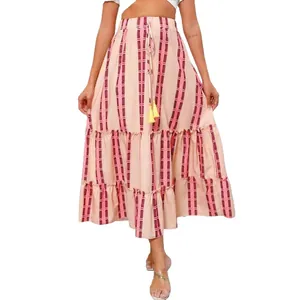 Bohemian summer maxi skirt with pink striped print and tassel drawstring waist detail