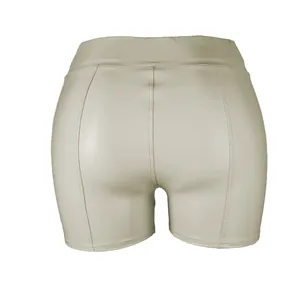 Detailed back view of women's beige high waist PU leather sexy hot pants for nightclub wear