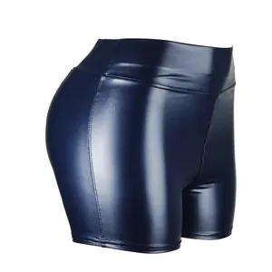Close-up side view detail of women's navy blue high-waisted glossy PU leather hot pants