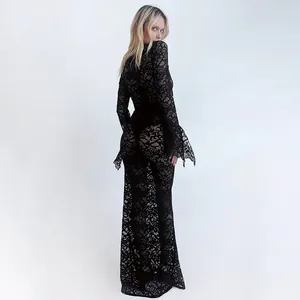 Elegant back view of a sexy black lace maxi dress featuring stylish trumpet sleeves