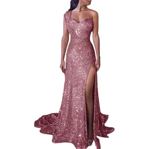 Detail showing the rose gold sequin texture and high slit design on this elegant evening dress