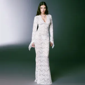 Elegant white floral lace maxi dress with deep V-neckline and retro flared sleeves detail