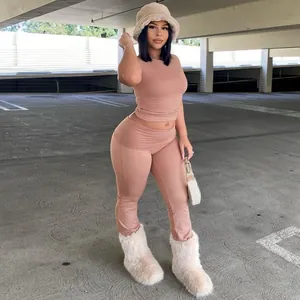 Stylish dusty rose two-piece set with a slim crop top and high-waist leggings for women.