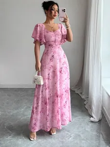 Elegant pink floral maxi dress featuring ruffled flutter sleeves and a slim-fit square neck